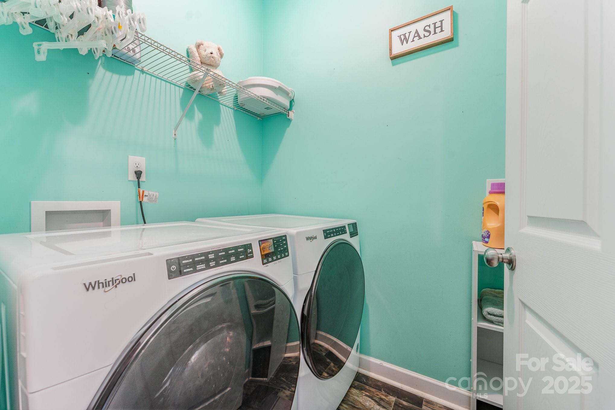 4242 Lake Ridge Court Ramseur, NC 27316 - Photo 27 of 33 a utility room with dryer and washer