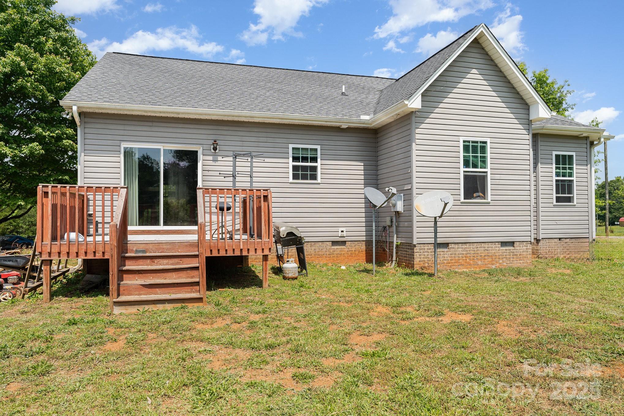 4242 Lake Ridge Court Ramseur, NC 27316 - Photo 28 of 33 a front view of a house with a yard