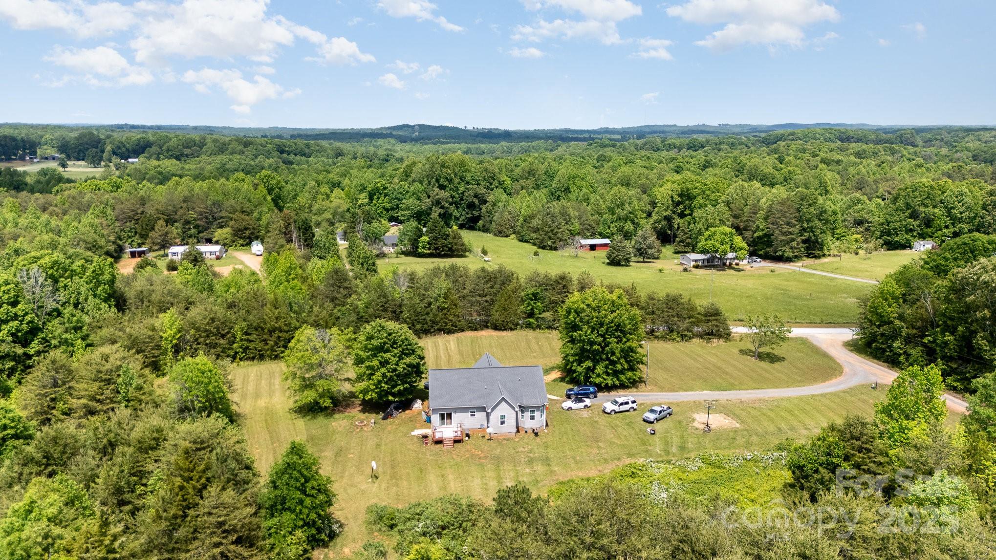 4242 Lake Ridge Court Ramseur, NC 27316 - Photo 31 of 33 an aerial view of residential house with outdoor space