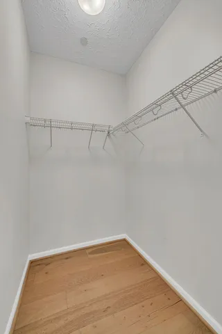 a view of a room with racks on the wall