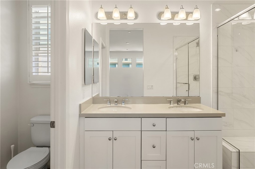 421 Maravilla Lane Brea, CA 92823 - Photo 17 of 22 a bathroom with a sink vanity granite and a mirror