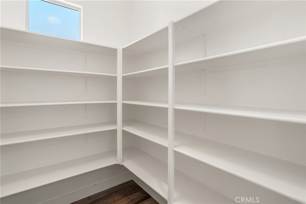 421 Maravilla Lane Brea, CA 92823 - Photo 19 of 22 a view of walk in closet with empty racks