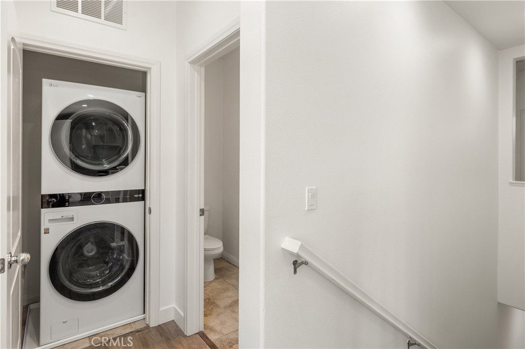 421 Maravilla Lane Brea, CA 92823 - Photo 20 of 22 a view of a hallway with washer and dryer