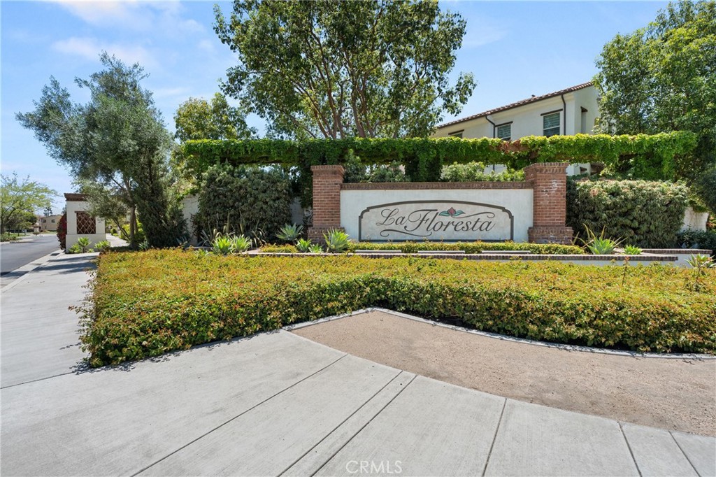 421 Maravilla Lane Brea, CA 92823 - Photo 22 of 22 a view of street sign under a large tree