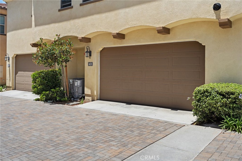 421 Maravilla Lane Brea, CA 92823 - Photo 3 of 22 a front view of a house with a garden