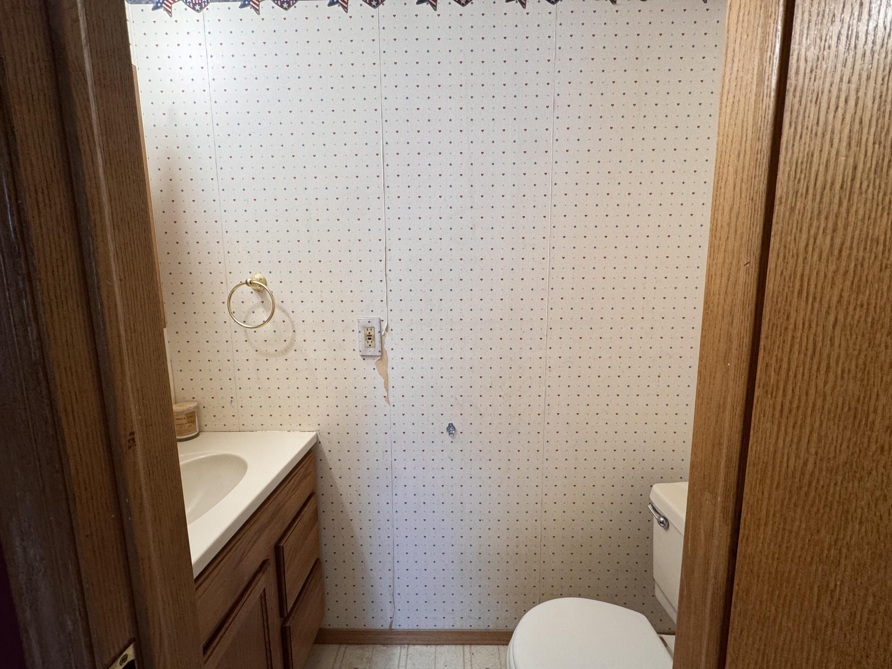 3899 Fruit Ridge Avenue Northwest Grand Rapids, MI 49544 - Photo 23 of 27 half bath