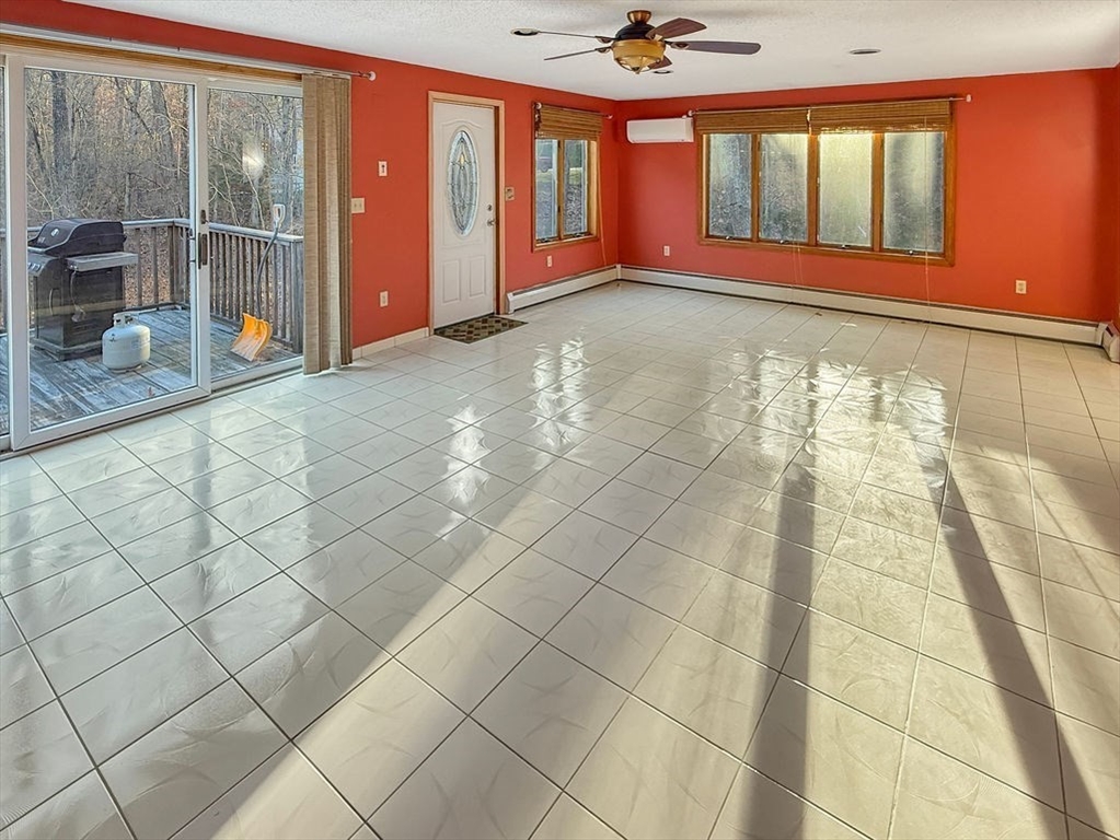 8 Cheney Drive Hudson, NH 03051 - Photo 19 of 42 a view of an empty room and window
