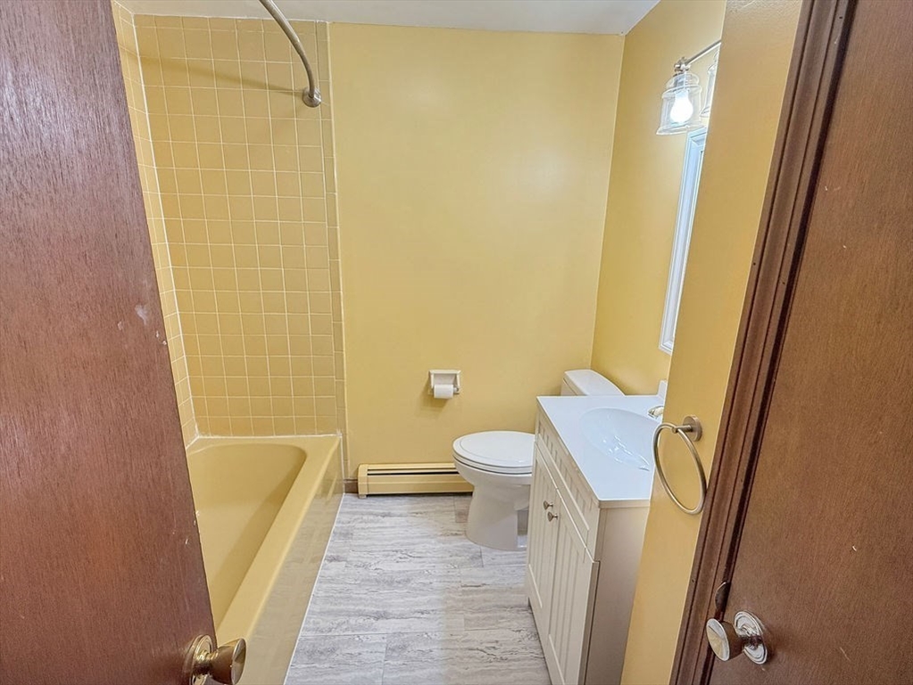 8 Cheney Drive Hudson, NH 03051 - Photo 21 of 42 a bathroom with a sink a toilet and shower