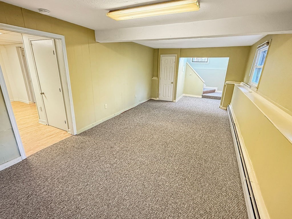 8 Cheney Drive Hudson, NH 03051 - Photo 34 of 42 a view of hallway with wooden floor