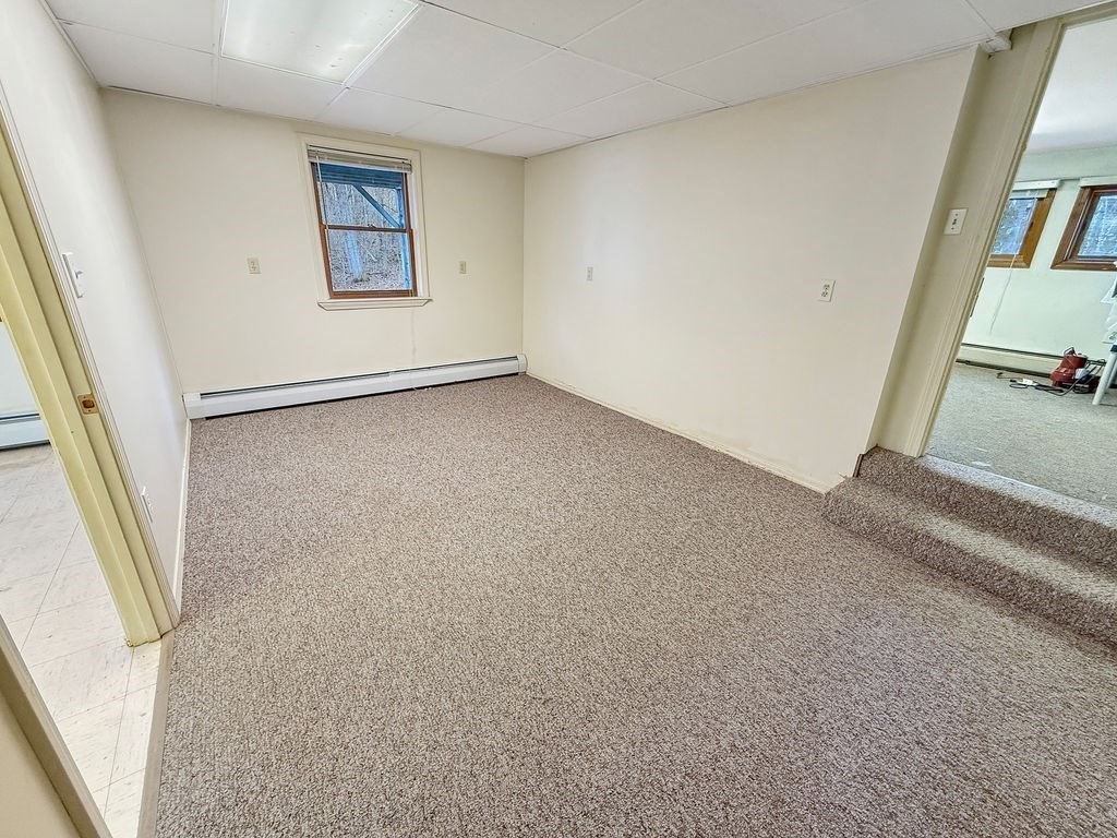8 Cheney Drive Hudson, NH 03051 - Photo 40 of 42 an empty room with windows