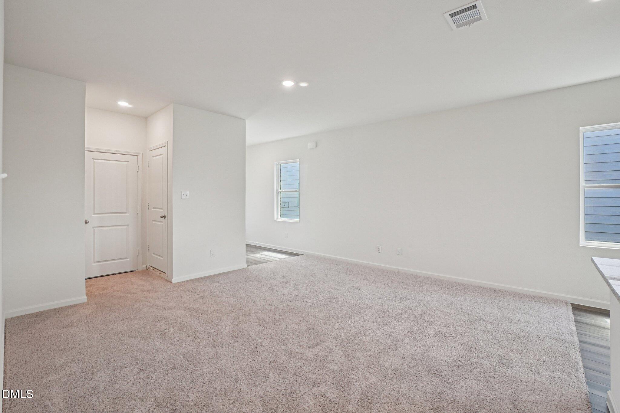 1316 Solace Way Rolesville, NC 27571 - Photo 5 of 29 a view of an empty room with a window