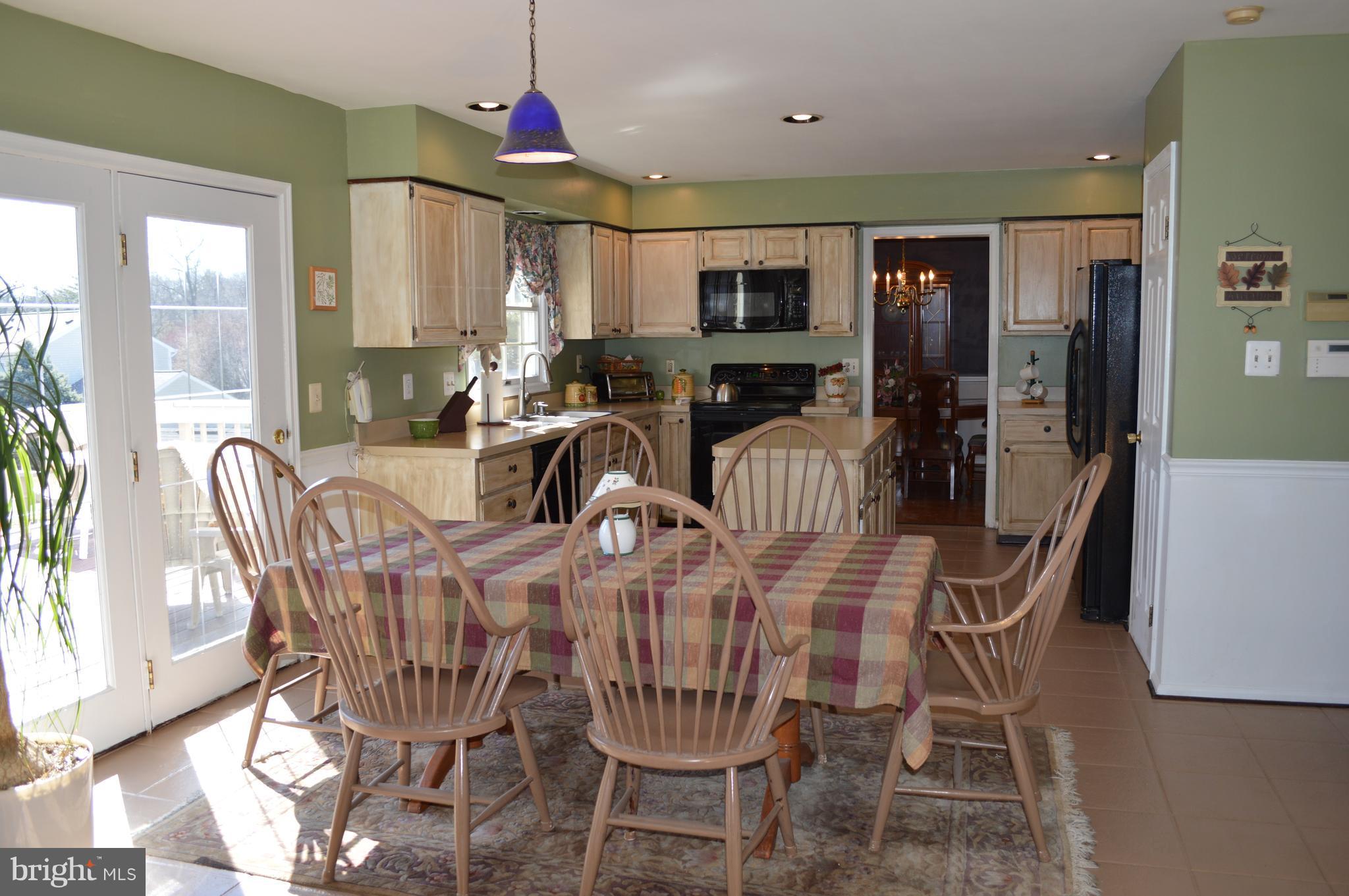 12547 Rock Ridge Road Herndon, VA 20170 - Photo 6 of 30 Large Breakfast Area opens to Deck