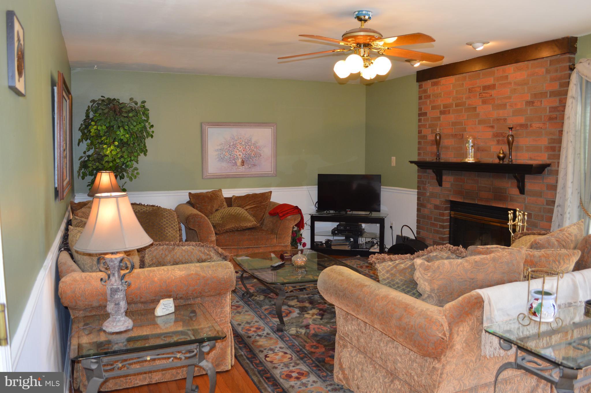 12547 Rock Ridge Road Herndon, VA 20170 - Photo 7 of 30 Family Room has Wood-burning Fireplace