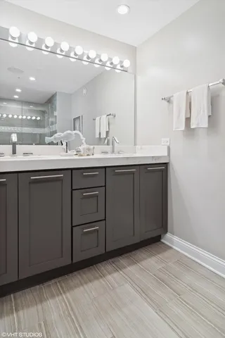 a bedroom with a bed a couch and a window