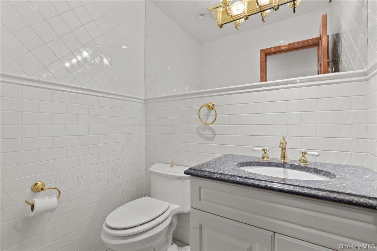7 Greystone Circle Bronxville, NY 10708 - Photo 5 of 30 Powder Room by kitchen.