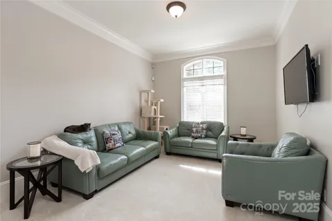 a view of a backyard with sitting area