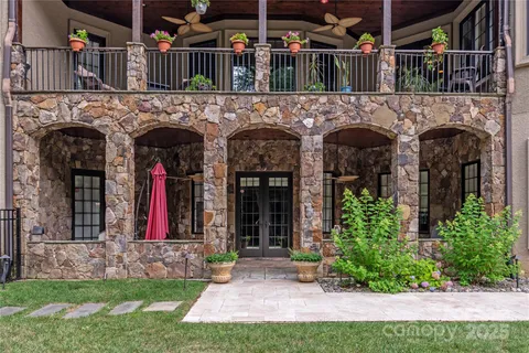 an aerial view of a house with a garden