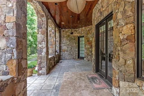 an aerial view of a house with a garden