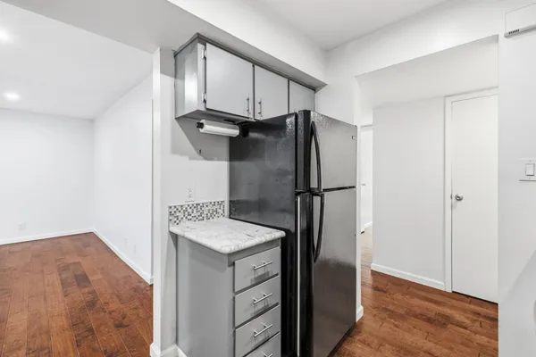 a kitchen with a stove and a microwave