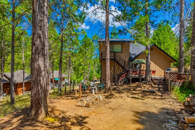 a view of swimming pool with a yard