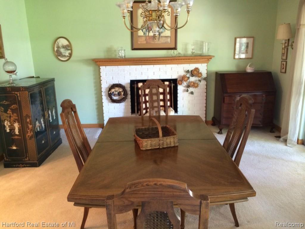44112 Brandywyne Road Canton, MI 48187 - Photo 7 of 17 Dinning Room With Fireplace
