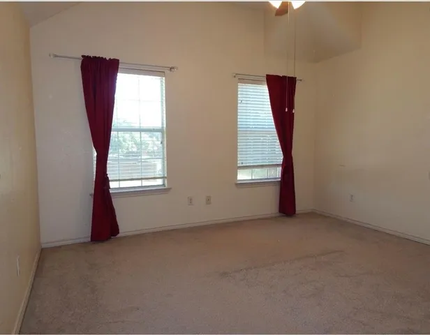 a house view with a backyard space