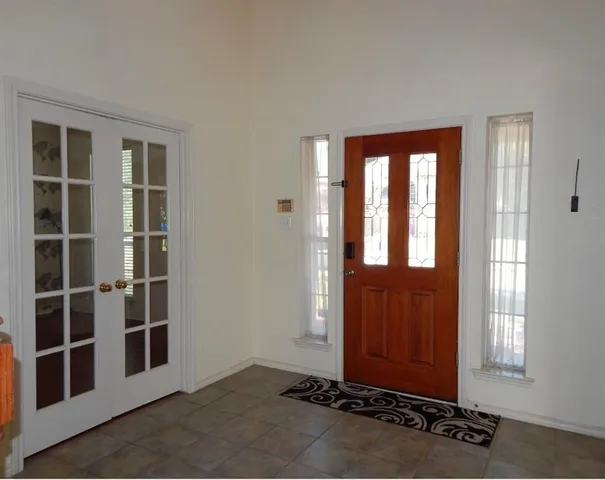 an empty room with windows