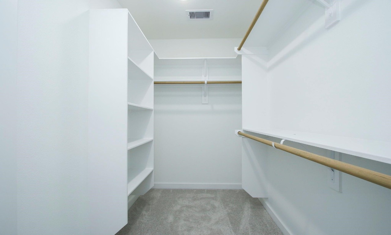 2709 Discovery Trails Conroe, TX 77301 - Photo 12 of 24 a view of an empty walk in closet