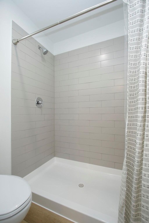 2709 Discovery Trails Conroe, TX 77301 - Photo 14 of 24 a bathroom with a shower and a toilet