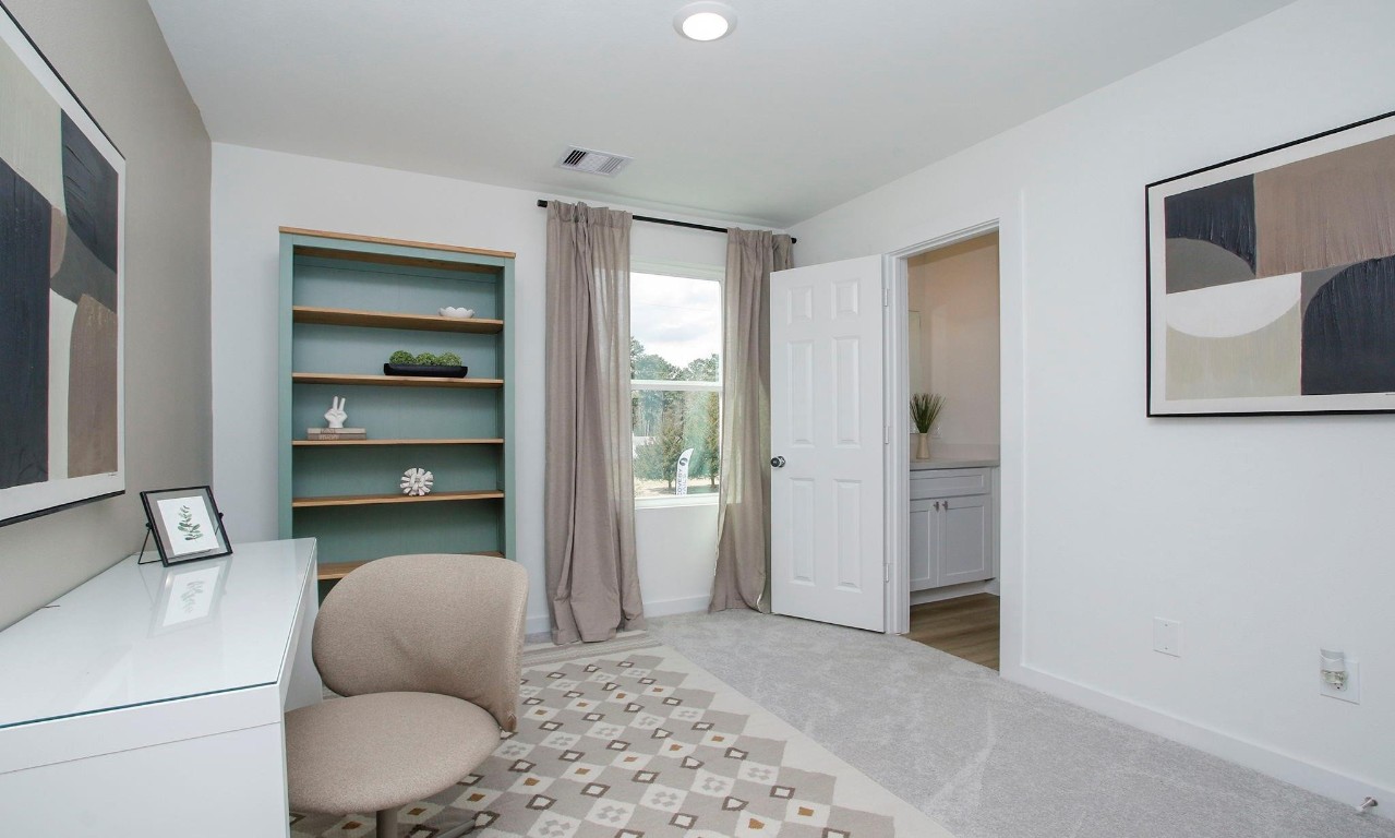 2709 Discovery Trails Conroe, TX 77301 - Photo 15 of 24 a room with furniture and a window