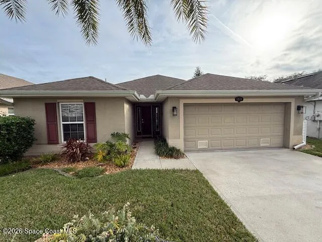 front view of house with a yard