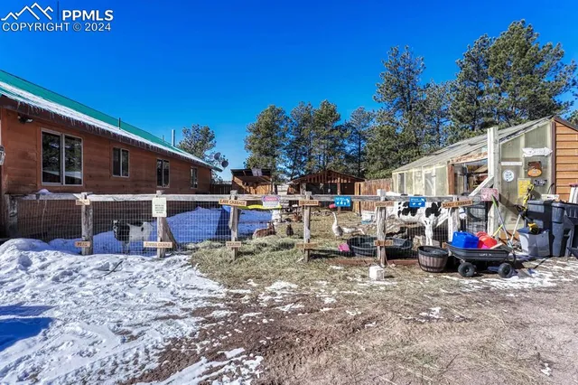 a view of a street with cars
