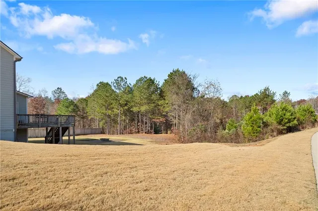 a view of large space with trees