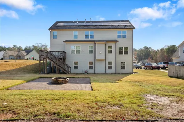 a view of a house with a ocean view