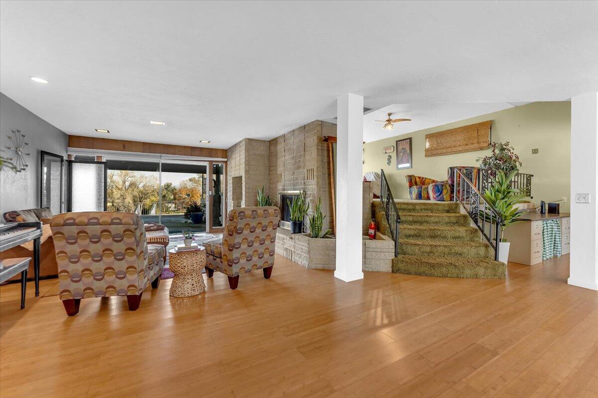 846 Rio Street Red Bluff, CA 96080 - Photo 13 of 73 a living room with furniture large wooden floor and a large window
