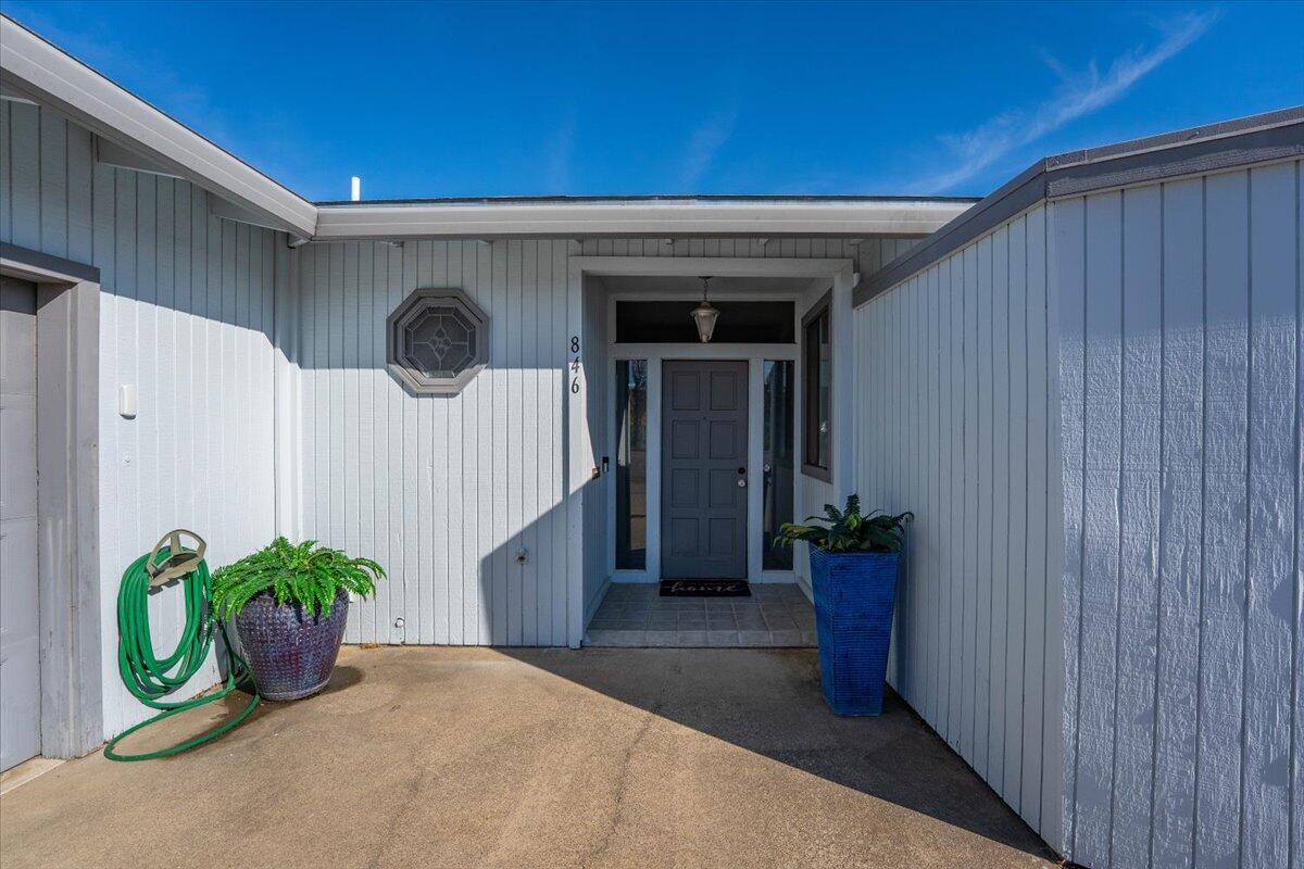846 Rio Street Red Bluff, CA 96080 - Photo 5 of 73 a front view of a house with potted plants