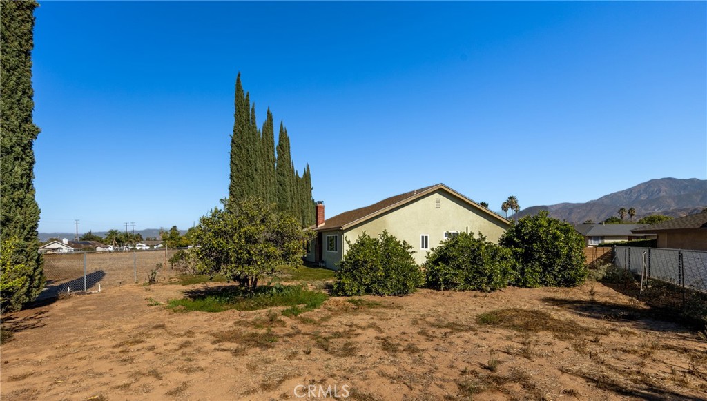 365 Midori Lane Calimesa, CA 92320 - Photo 20 of 26 a view of a house with a snow in the background