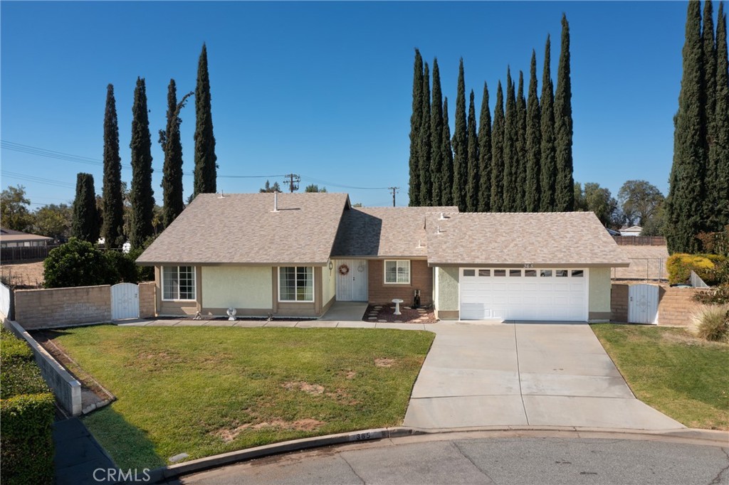 365 Midori Lane Calimesa, CA 92320 - Photo 21 of 26 a view of a house with a swimming pool