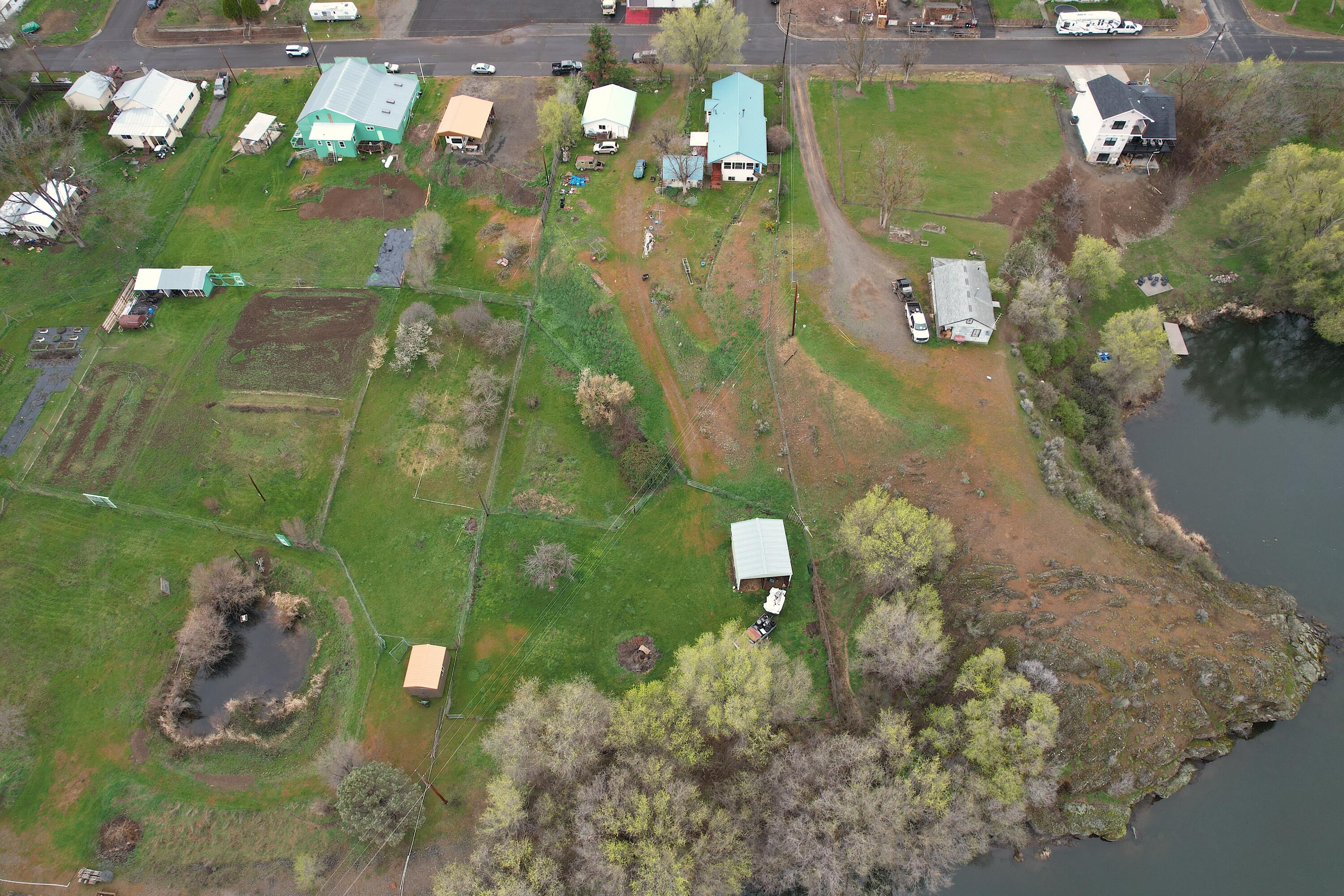 298 Main Street Monument, OR 97864 - Photo 55 of 66 an aerial view of a house with a yard