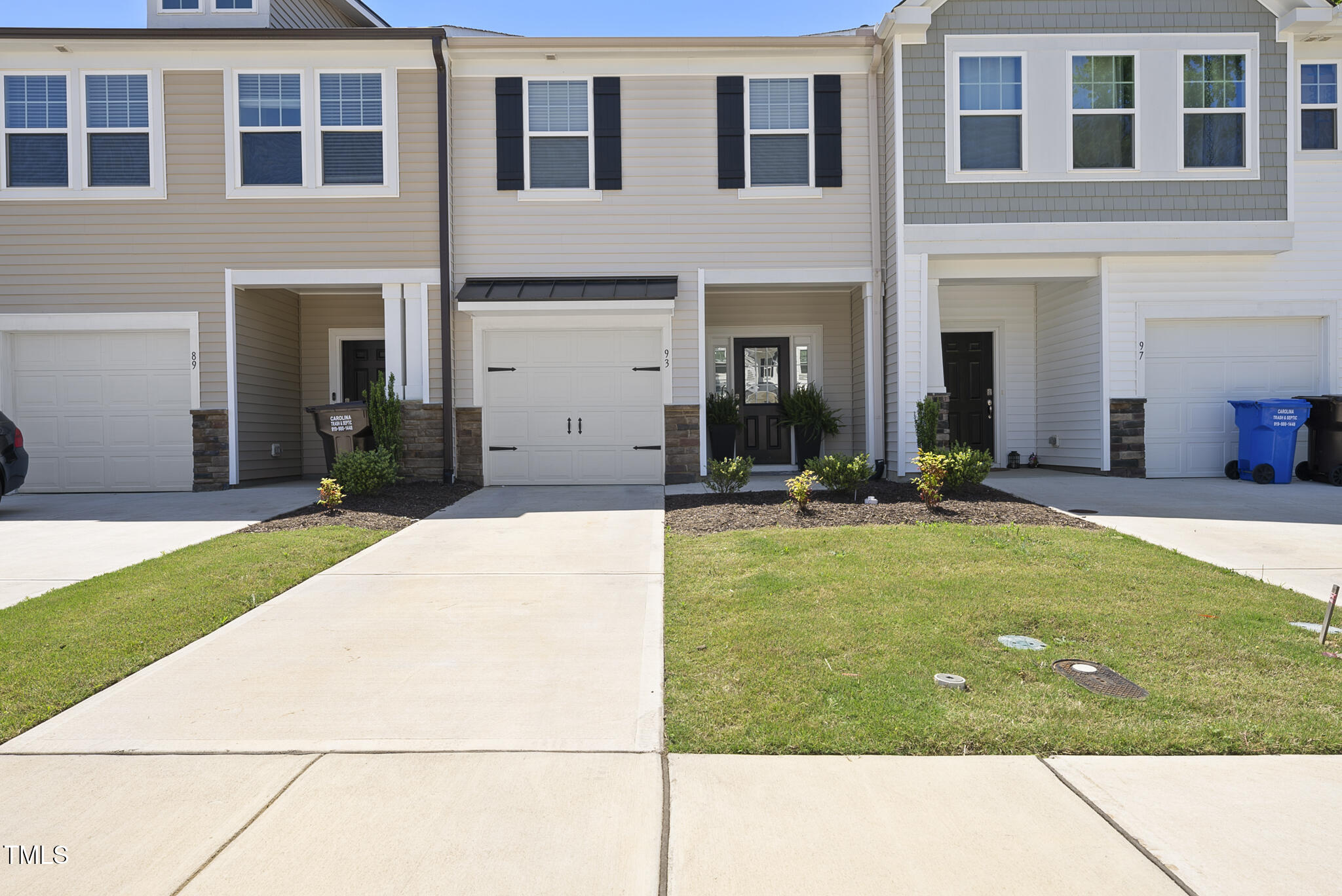 93 Begonia Street Angier, NC 27501 - Photo 1 of 29 a view of a building with a yard