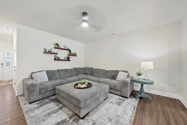 a living room with furniture and a couch