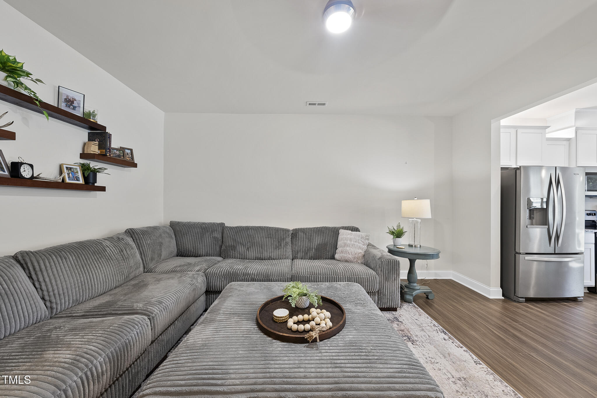 93 Begonia Street Angier, NC 27501 - Photo 8 of 29 a living room with furniture and a couch