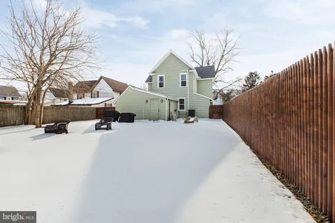 a view of swimming pool with seating space