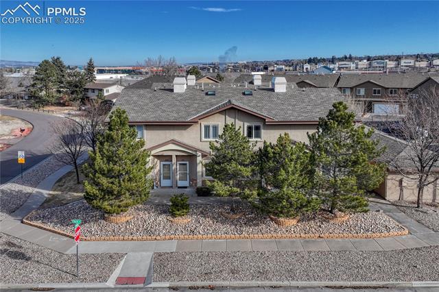 1502 York Road, Unit 102 Colorado Springs, CO 80920 - Photo 25 of 29 View of front facade with a residential view and stucco siding