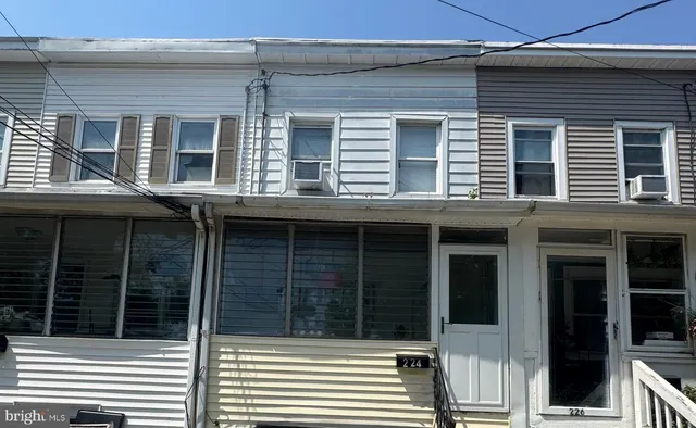 a view of a house with a large window