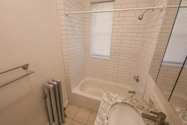 a bathroom with a sink and a tub