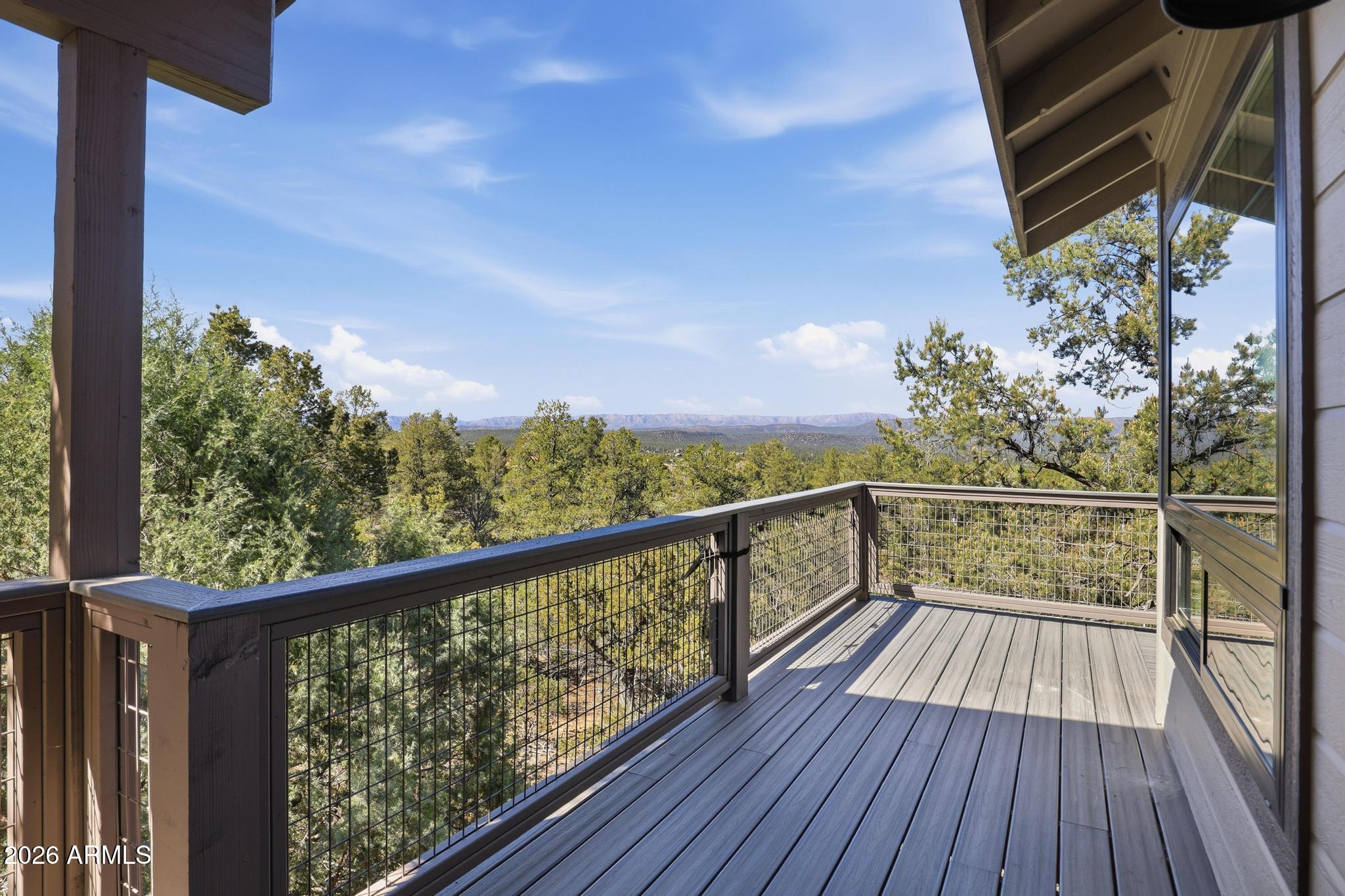 1908 East Starlight Pass Payson, AZ 85541 - Photo 12 of 30 a view of a balcony with wooden floor