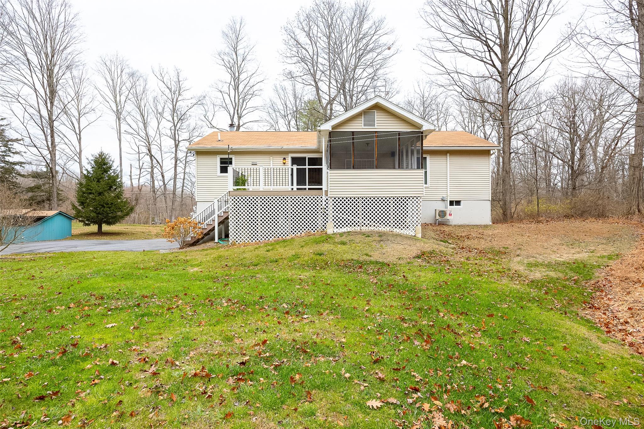 26 St Paul Road Red Hook, NY 12571 - Photo 25 of 35 a front view of a house with a yard and trees