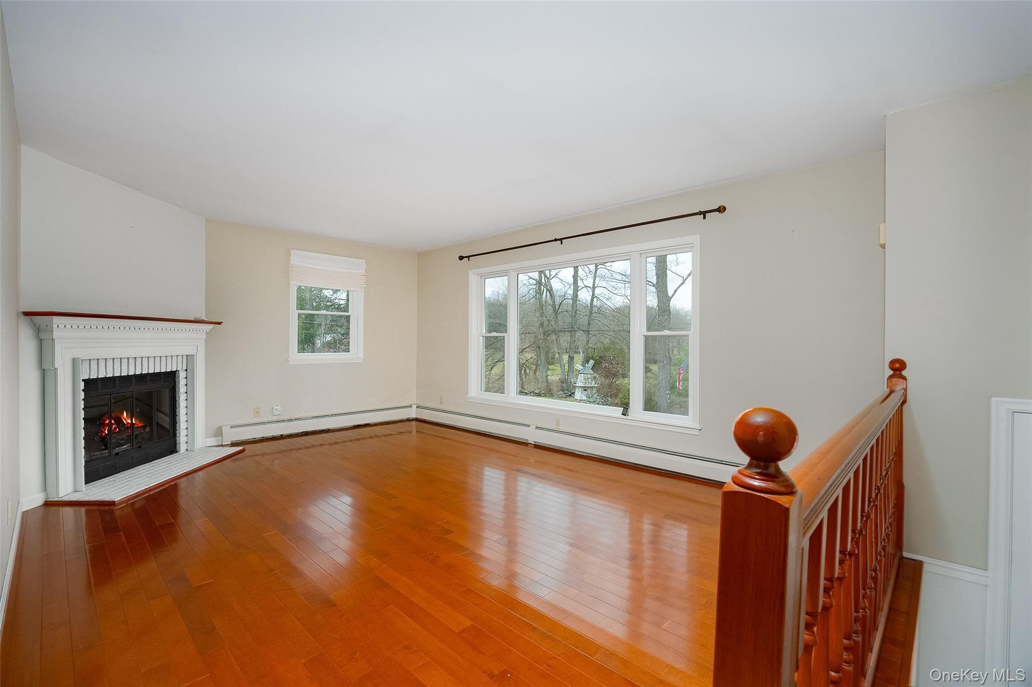 26 St Paul Road Red Hook, NY 12571 - Photo 4 of 35 a view of a living room with furniture and floor to ceiling window