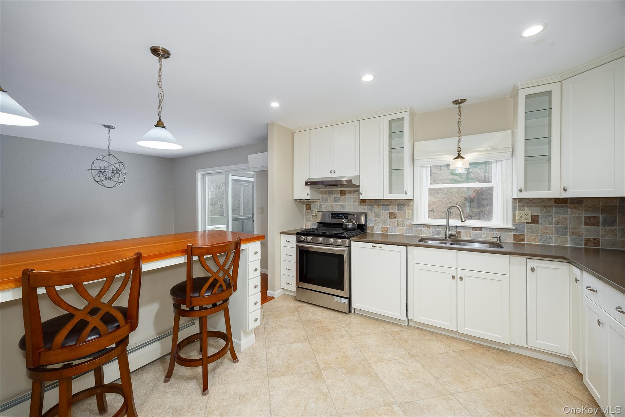 26 St Paul Road Red Hook, NY 12571 - Photo 6 of 35 a kitchen with stainless steel appliances kitchen island granite countertop a sink and cabinets